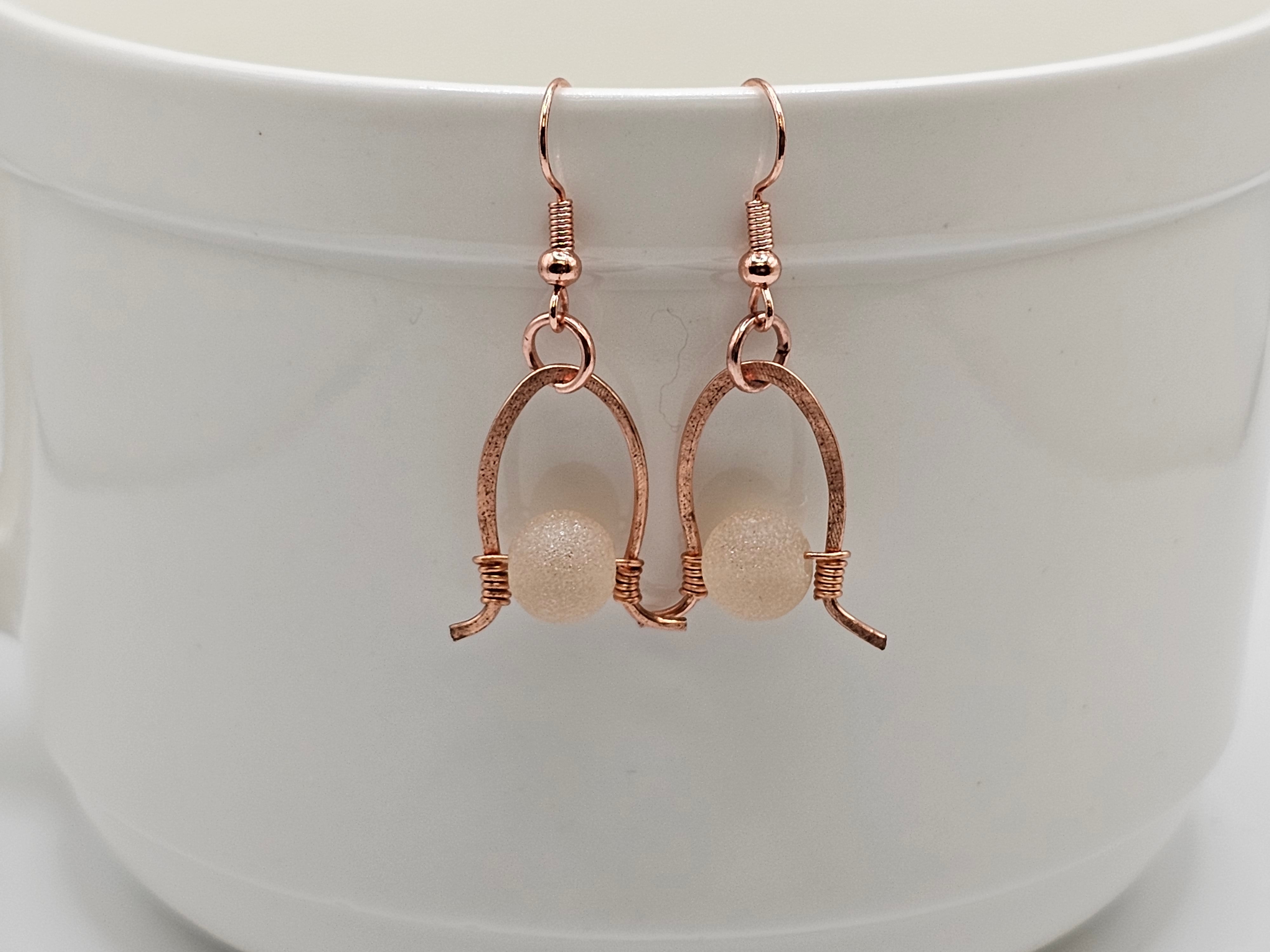 Copper horse shoe dangle earrings