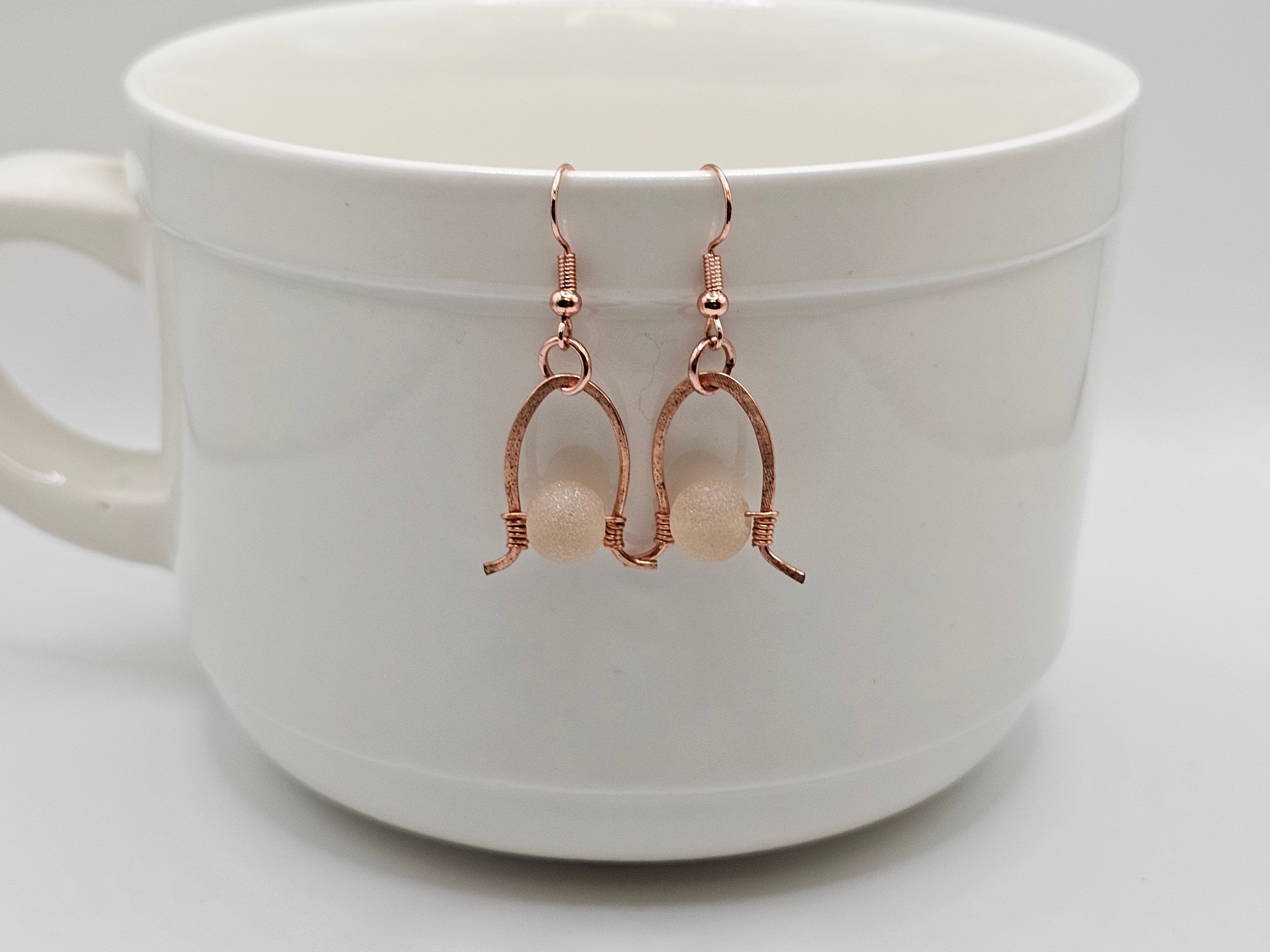 Copper horse shoe dangle earrings