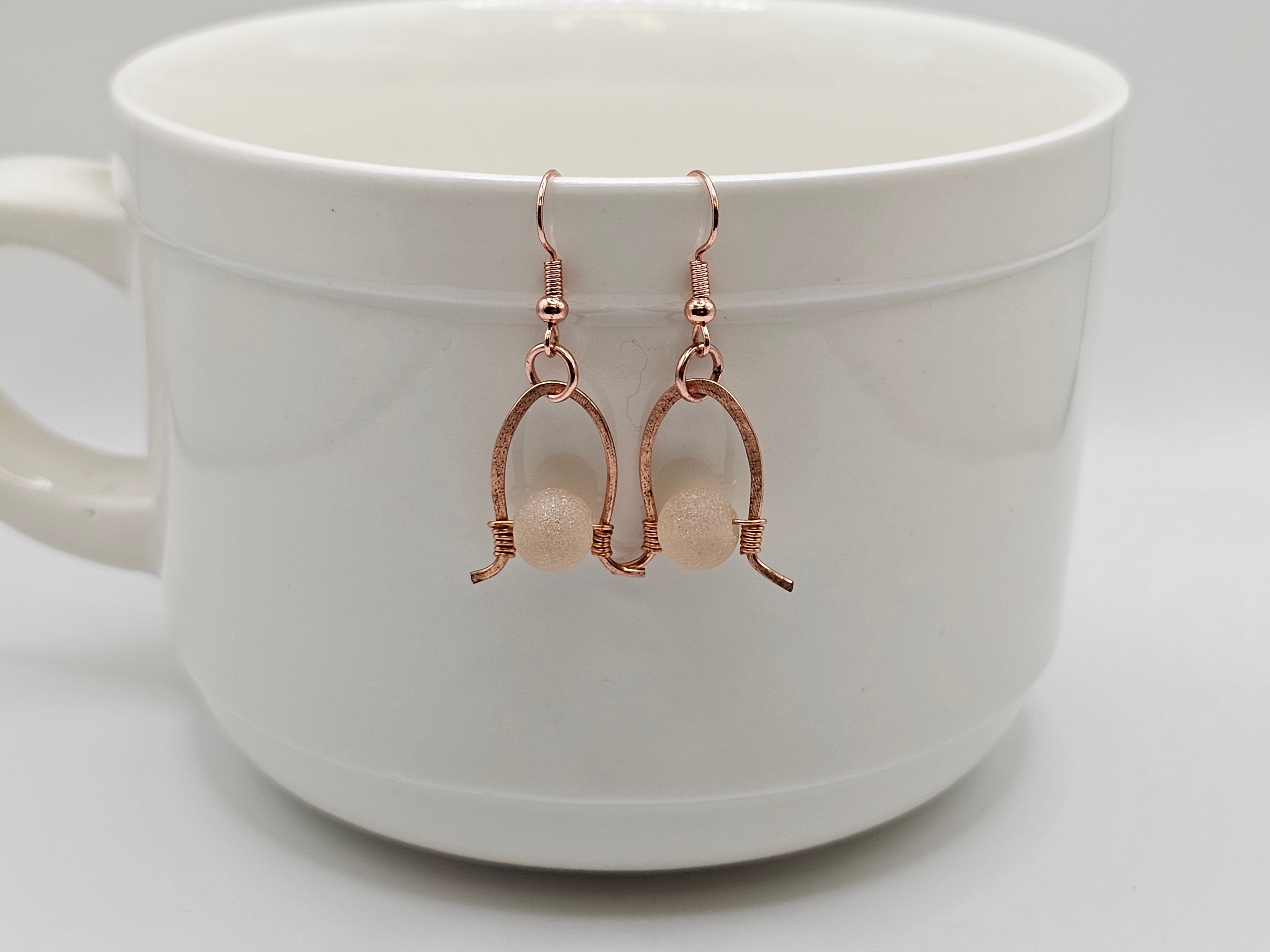 Copper horse shoe dangle earrings